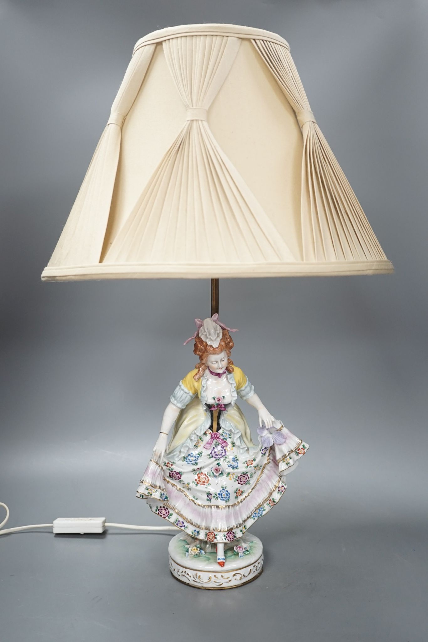 A German porcelain ‘dancing lady’ lamp